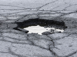 Illustration for article titled My solution to the pothole problem